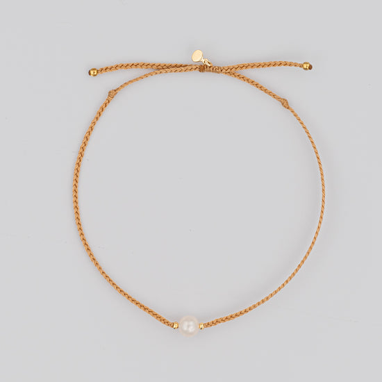 Single Pearl Bracelet on Woven Taupe Cord with Gold Accents