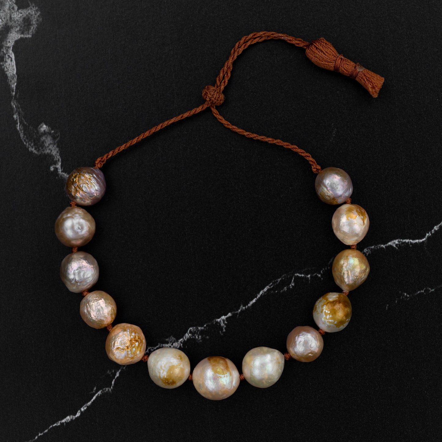 Load image into Gallery viewer, Chunky Peach Pearl Tassel Bracelet
