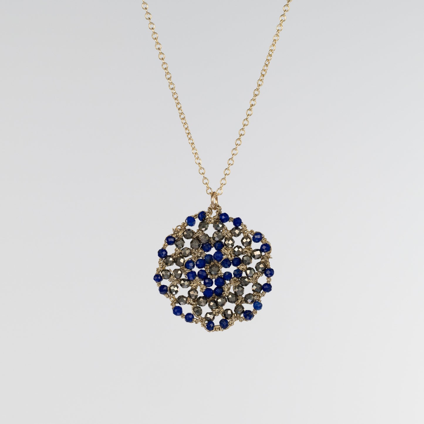 Load image into Gallery viewer, Danielle Welmond Woven Lapis and Pyrite Coin Necklace
