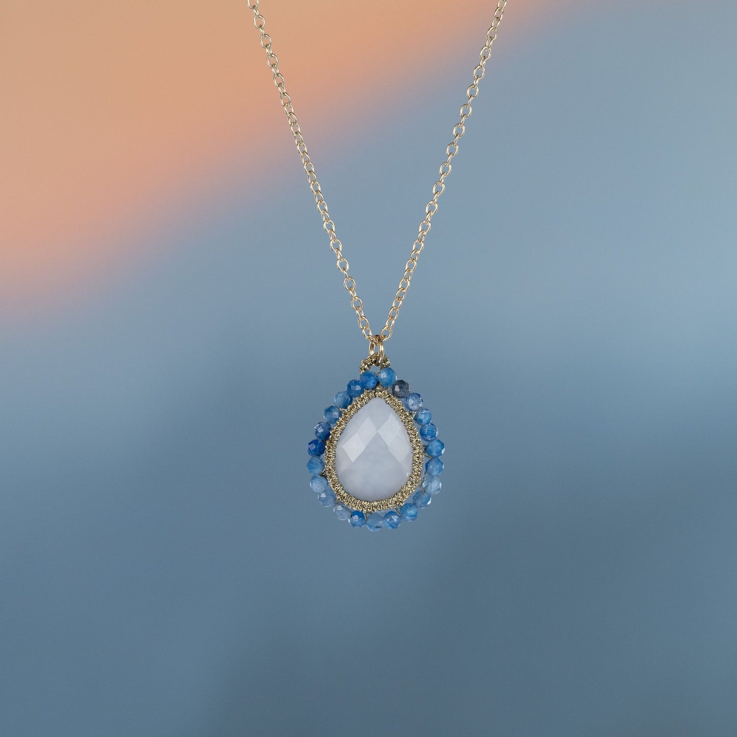 Load image into Gallery viewer, Danielle Welmond Caged Blue Chalcedony Necklace with Kyanite Orbit
