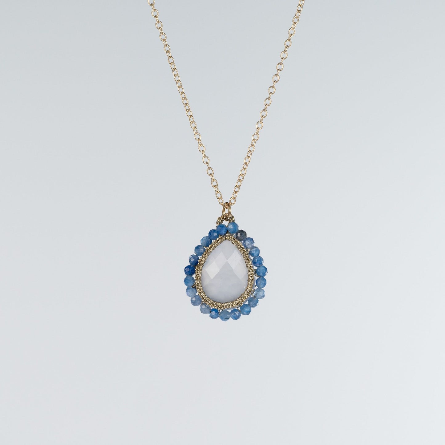 Load image into Gallery viewer, Danielle Welmond Caged Blue Chalcedony Necklace with Kyanite Orbit
