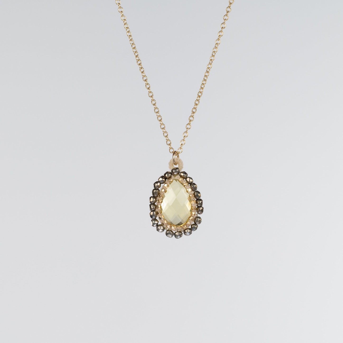 Danielle Welmond Caged Lemon Quartz Necklace with Pyrite Orbit