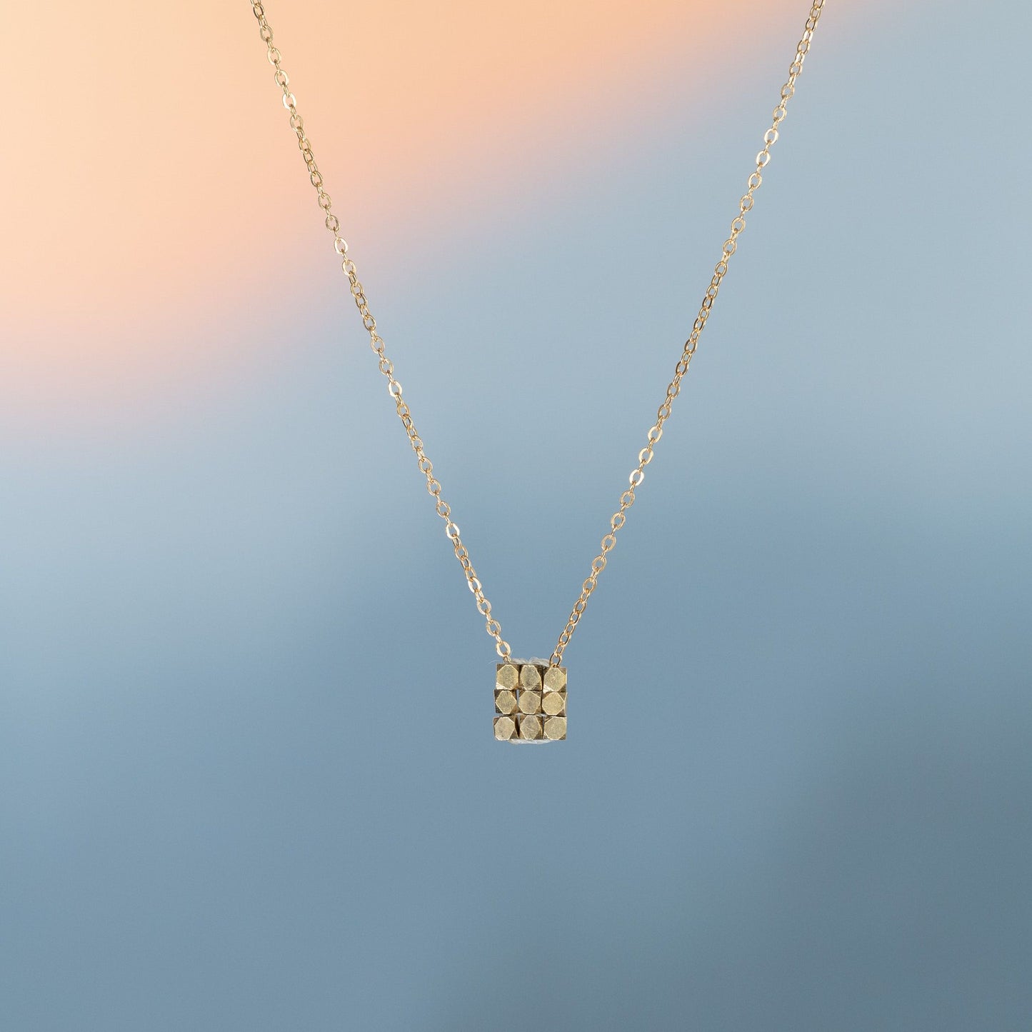 Load image into Gallery viewer, Danielle Welmond Woven Gold Square Bead Nugget Necklace
