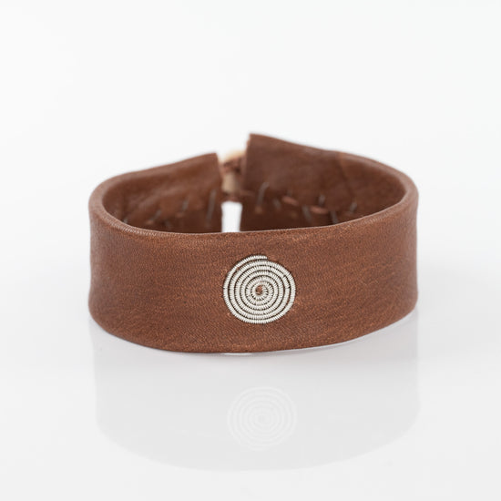 Spiral Silver Circle Bracelet on Chestnut Leather
