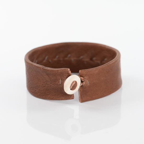 Spiral Silver Circle Bracelet on Chestnut Leather