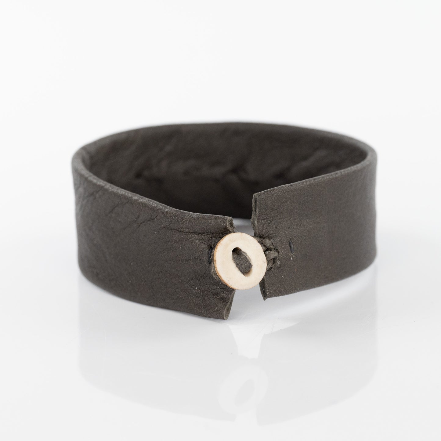 Spiral Silver Circle Bracelet on Khaki Leather