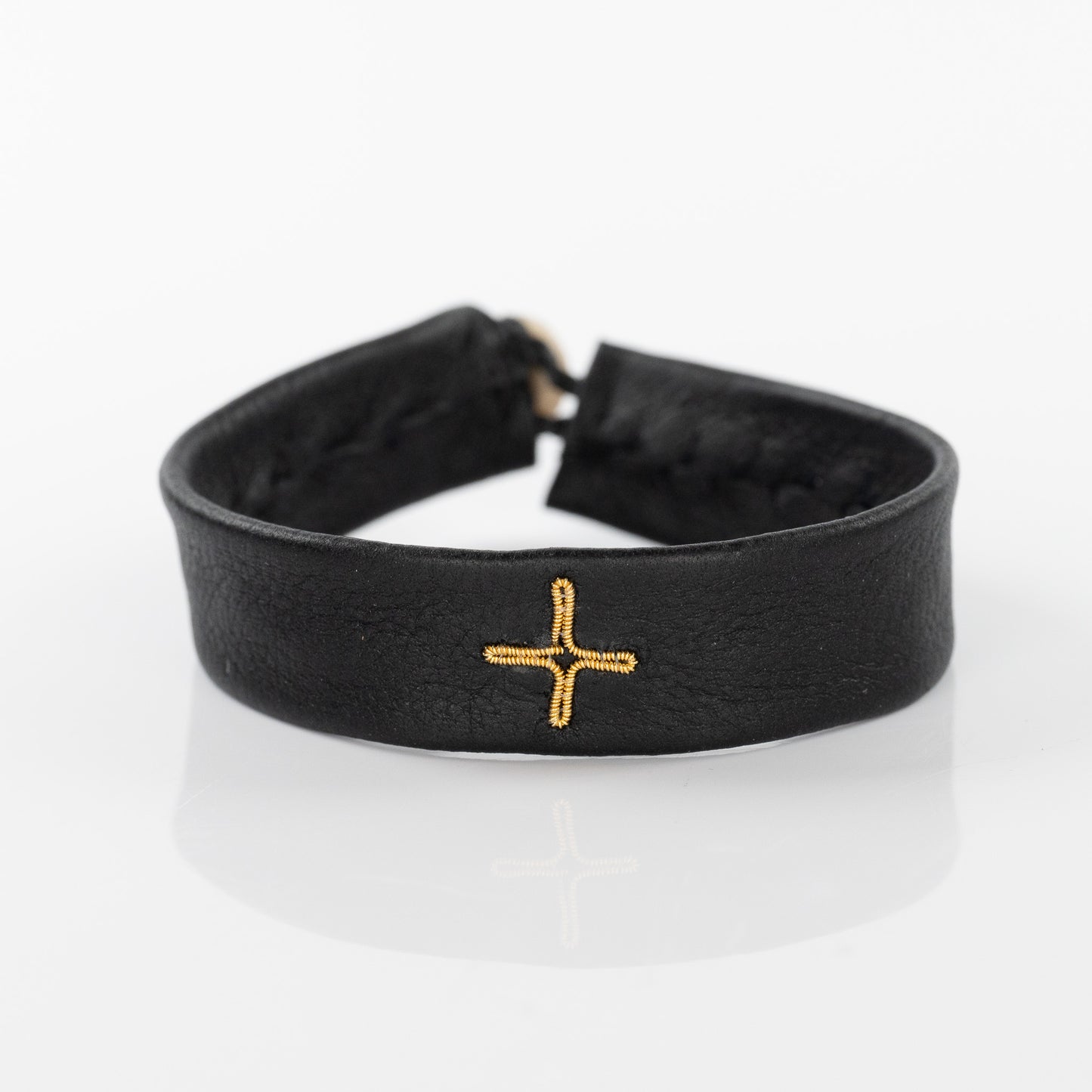 Load image into Gallery viewer, Gold Cross Bracelet on Black Leather
