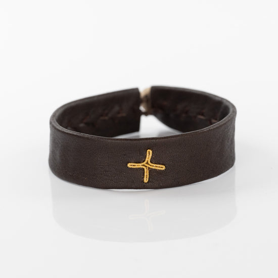 Gold Cross Bracelet on Brown Leather