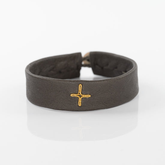 Gold Cross Bracelet on Khaki Leather