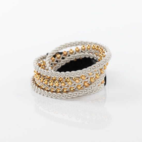 Load image into Gallery viewer, Lucia Silver and Gold Loose Strand Braid Bracelet with Black Closure
