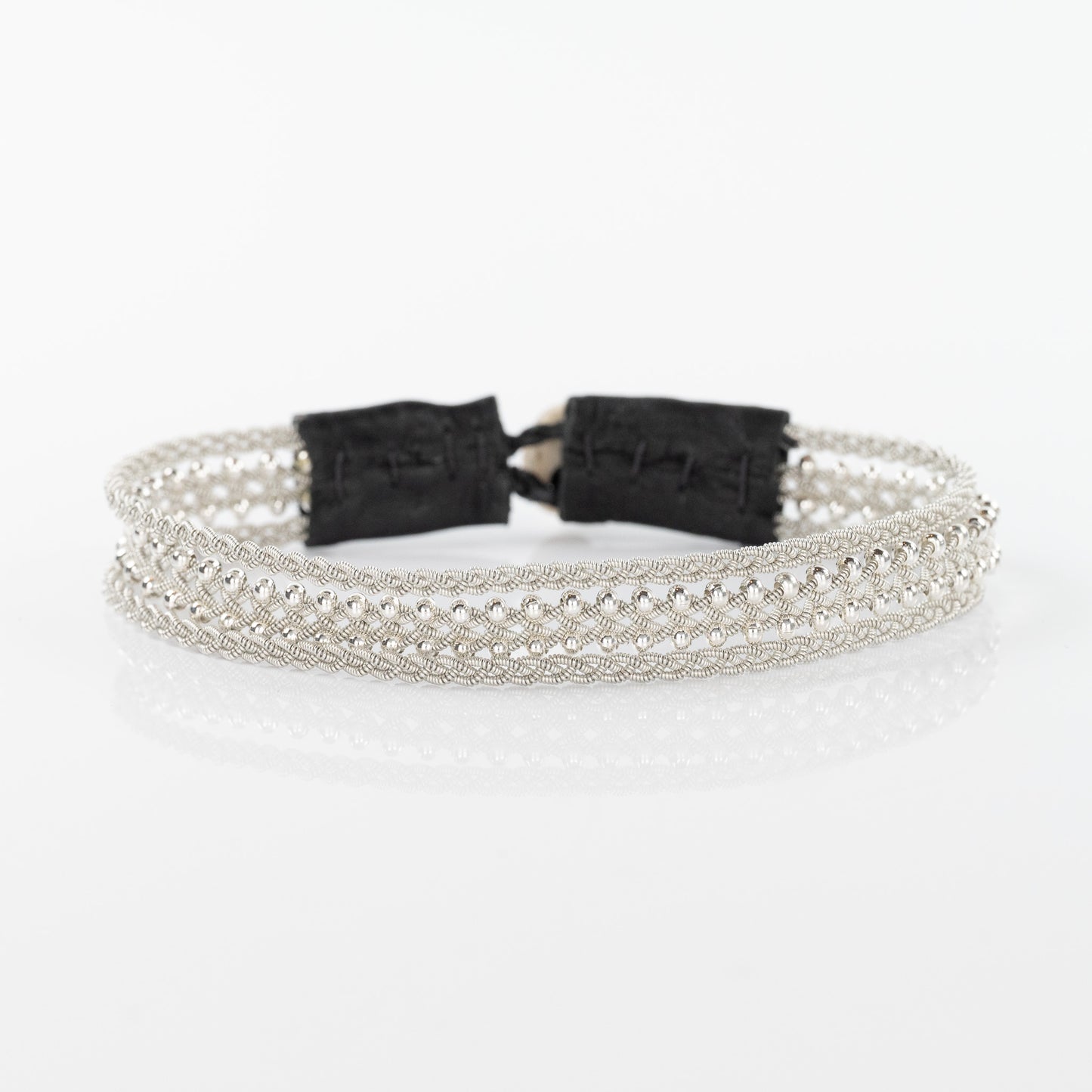 Load image into Gallery viewer, Lucia Silver Loose Strand Braid Bracelet with Black Closure

