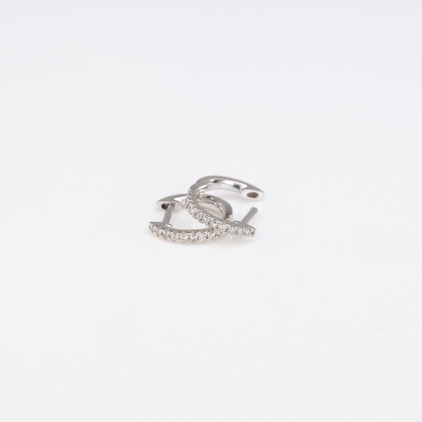 Load image into Gallery viewer, LIVEN 14K White Gold Extra Petite Diamond Huggies
