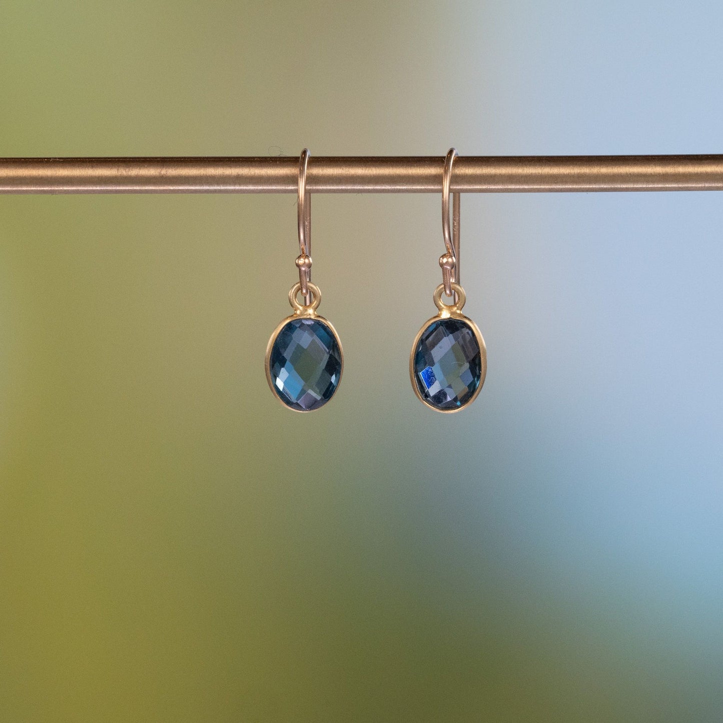Load image into Gallery viewer, 18K Yellow Gold Oval London Blue Topaz Dangle Earrings
