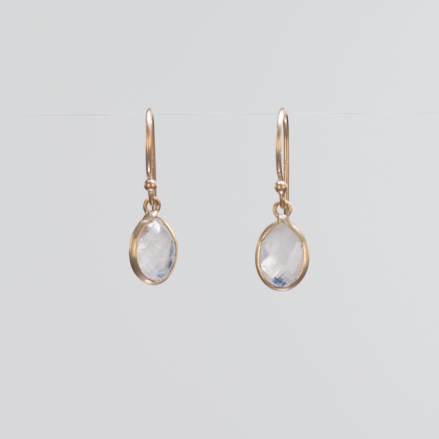 Load image into Gallery viewer, 14K Yellow Gold Oval Rainbow Moonstone Dangle Earrings
