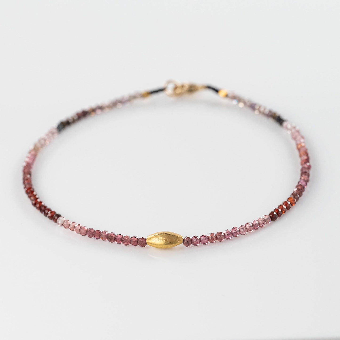 Red Sapphire + 18K Oblong Center Bead Bracelet