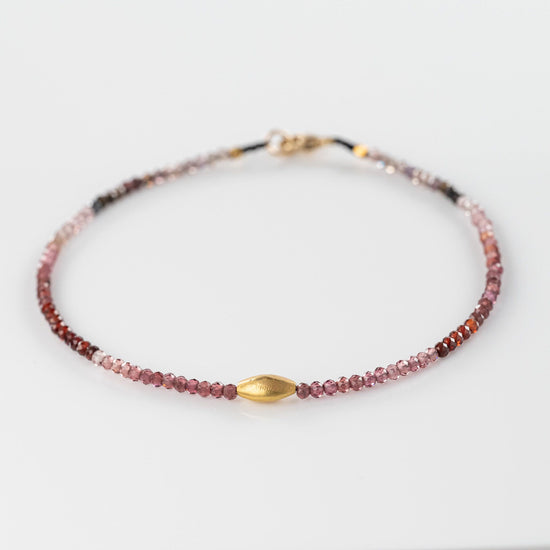 Load image into Gallery viewer, Red Sapphire + 18K Oblong Center Bead Bracelet
