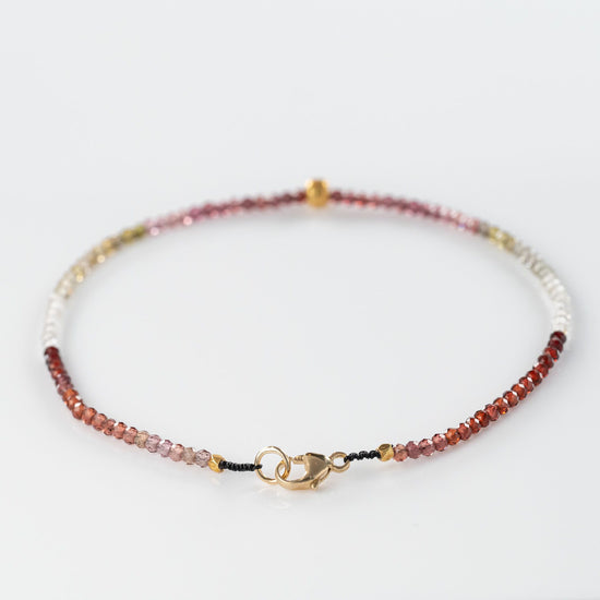 Load image into Gallery viewer, Red Sapphire + 18K Round Center Bead Bracelet
