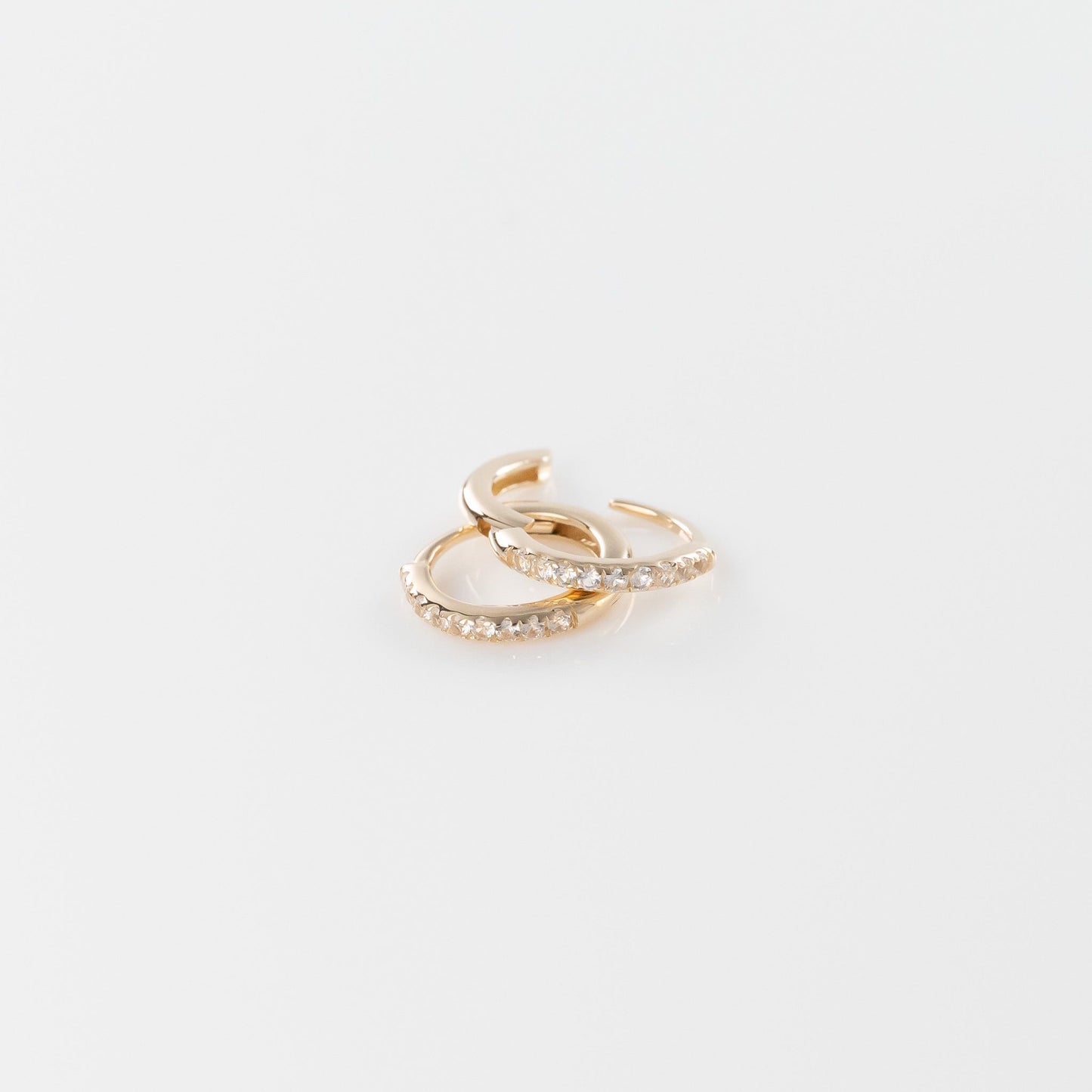 Load image into Gallery viewer, 14K Yellow Gold and White Sapphire 10 mm Huggies
