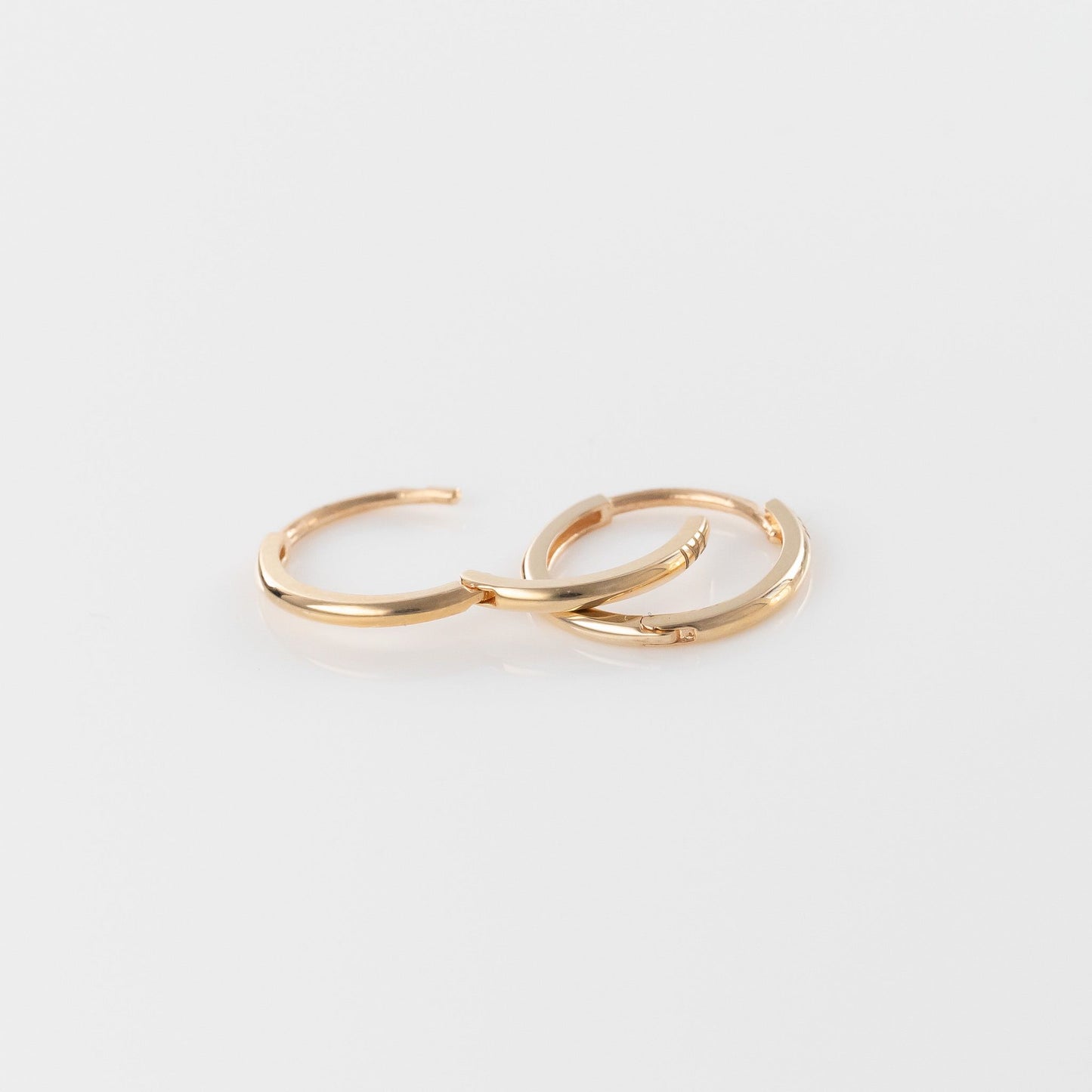 Load image into Gallery viewer, 14k Yellow Gold 12mm Huggies
